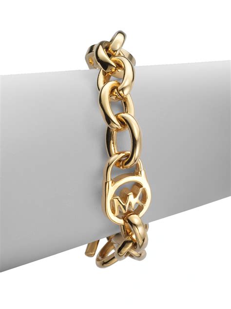 michael kors gold lock bracelet|Michael Kors gold bracelet women.